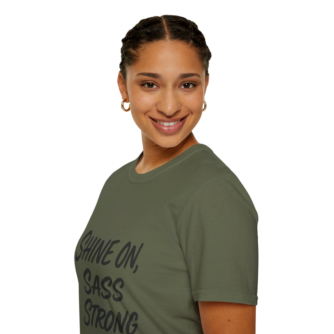 Female model wearing a green t-shirt with text, side view