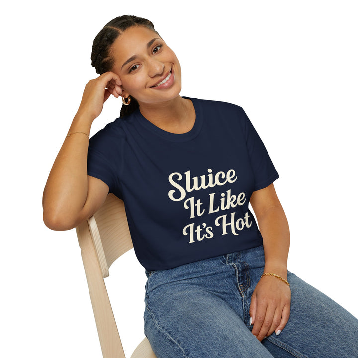 Female model  wearing a navy blue t-shirt with 'Sluice It Like It's Hot' text, sitting on a chair