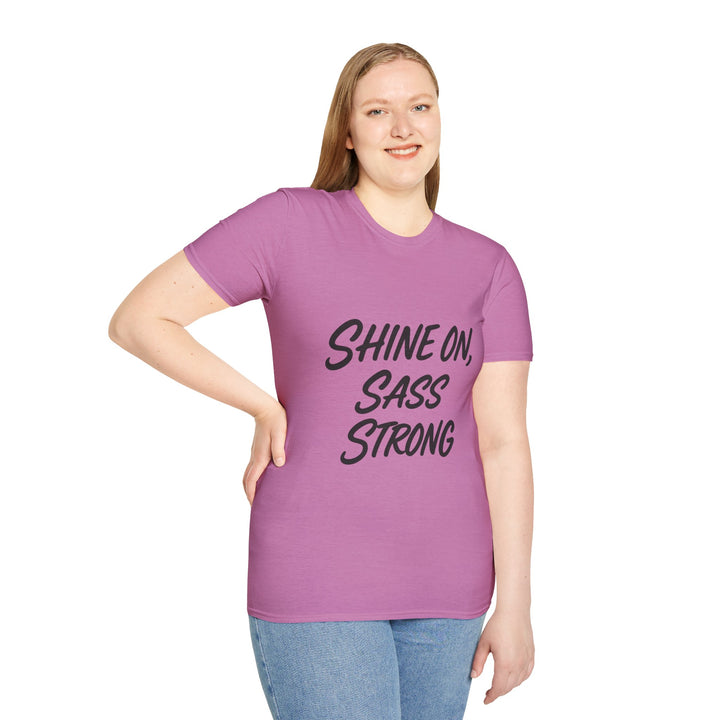 Female model  wearing a purple t-shirt with 'Shine On, Sass Strong' text