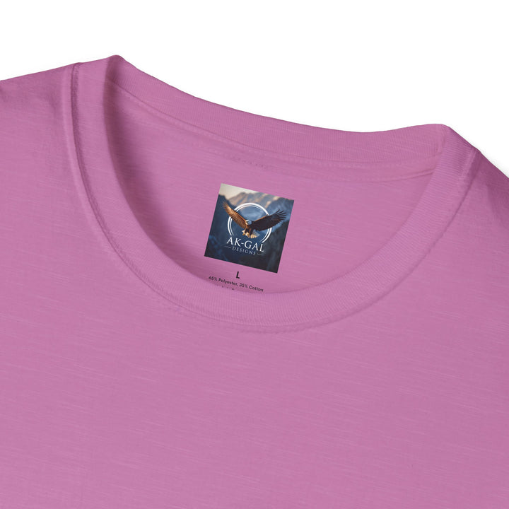 Close-up of a pink t-shirt with a brand label Ak Gal Designs
