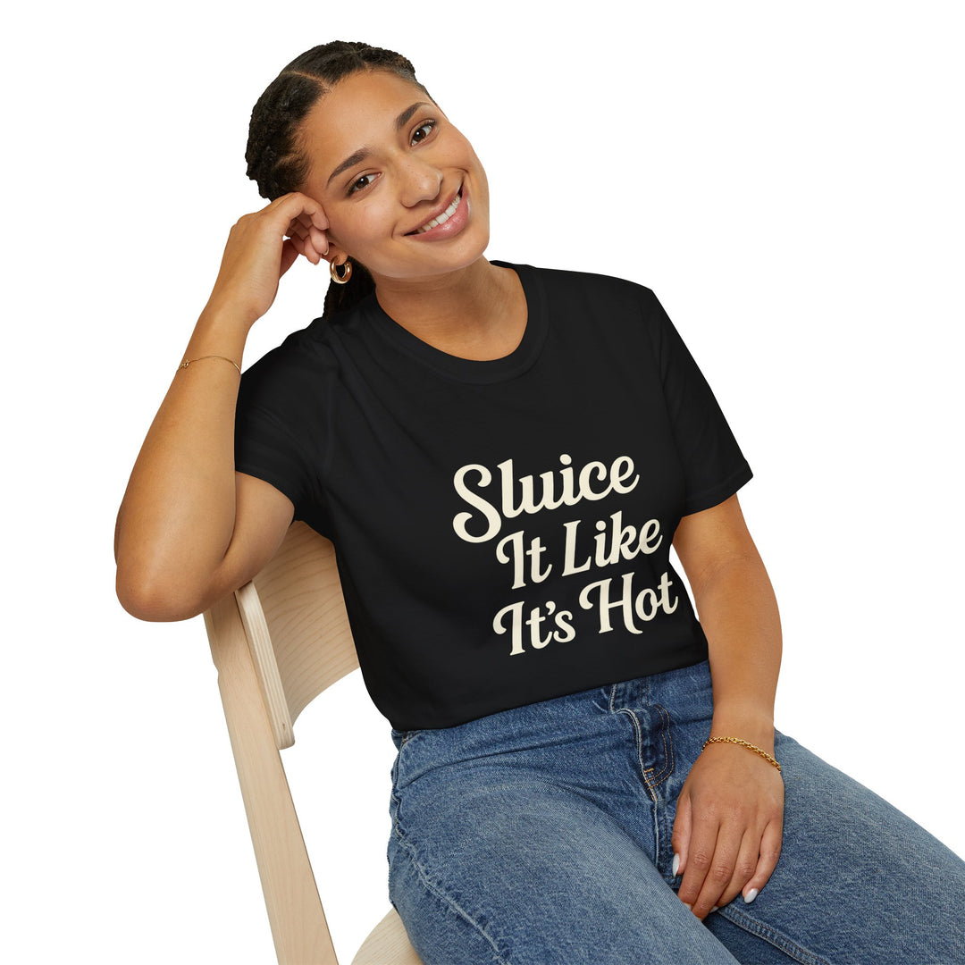 Female model wearing a black t-shirt with 'Sluice It Like It's Hot' text, sitting on a chair.