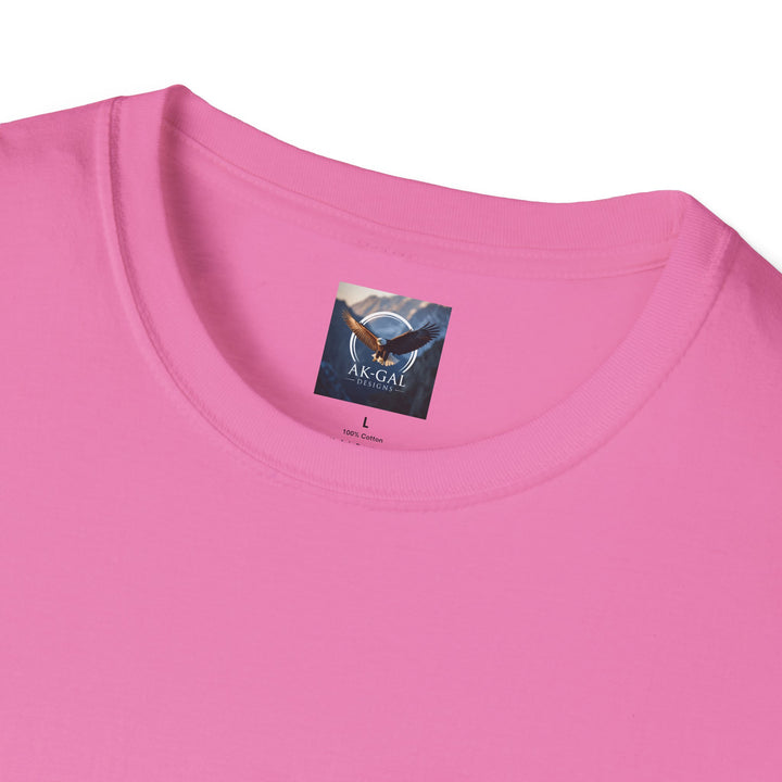 Close-up of a pink t-shirt with a brand label Ak Gal Designs
