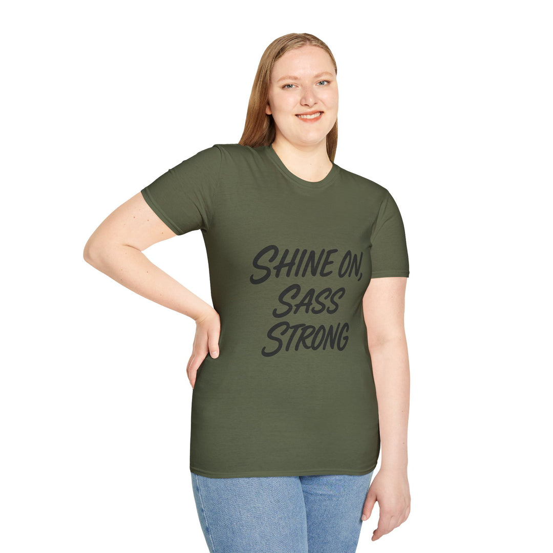Female model wearing a green t-shirt with 'Shine On, Sass Strong' text, front view