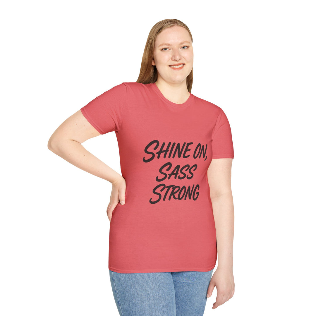 Model  wearing a red t-shirt with 'Shine On, Sass Strong' text, front view