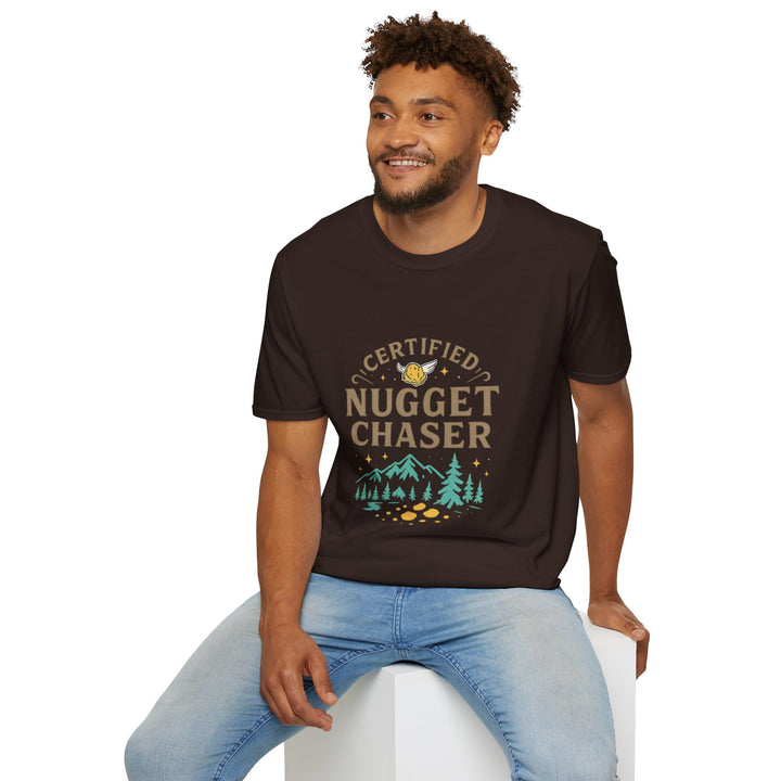 Male model wearing a black t-shirt with 'Certified Nugget Chaser' text, sitting on a white stool