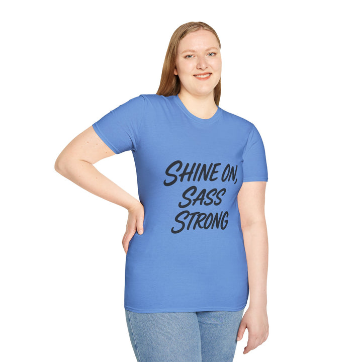 Model wearing a blue t-shirt with 'Shine On, Sass Strong' text 